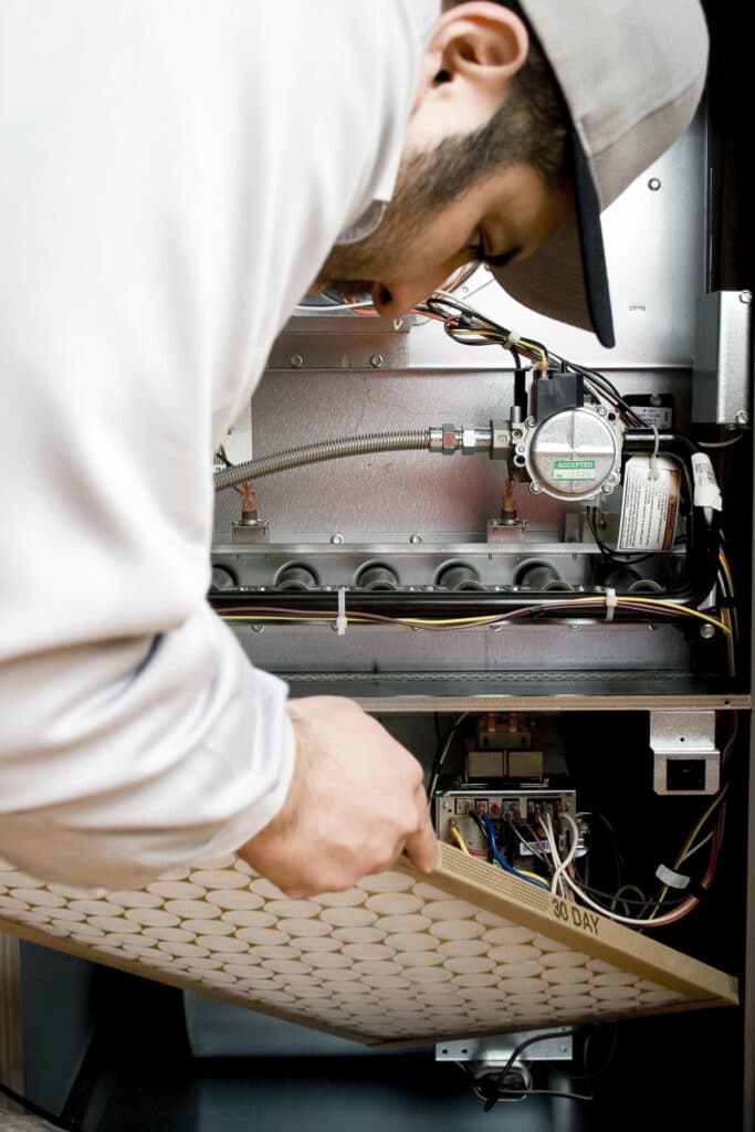 person replacing filter in Shreveport, LA