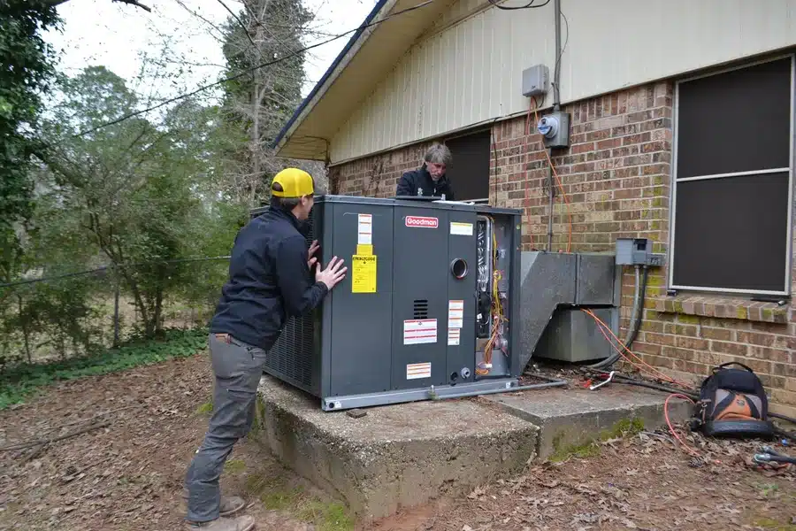 SBC technicians installing a Goodman HVAC unit in Shreveport, Louisiana, providing professional AC installation and residential heating services